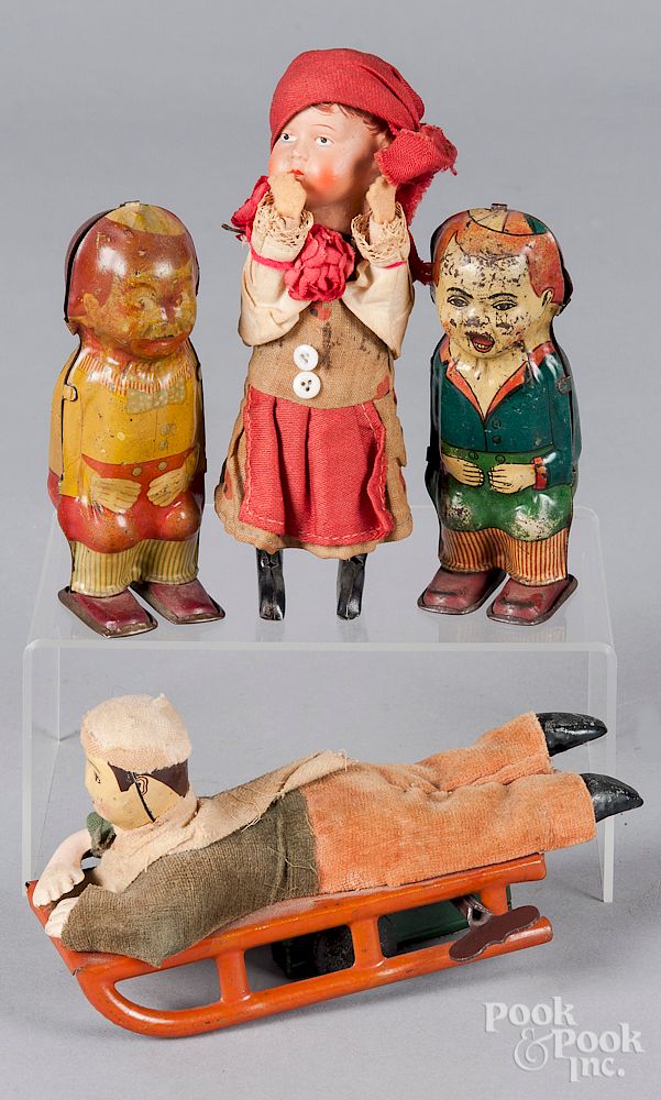 Appraisal: Four windup toys Four windup toys to include a Japanese