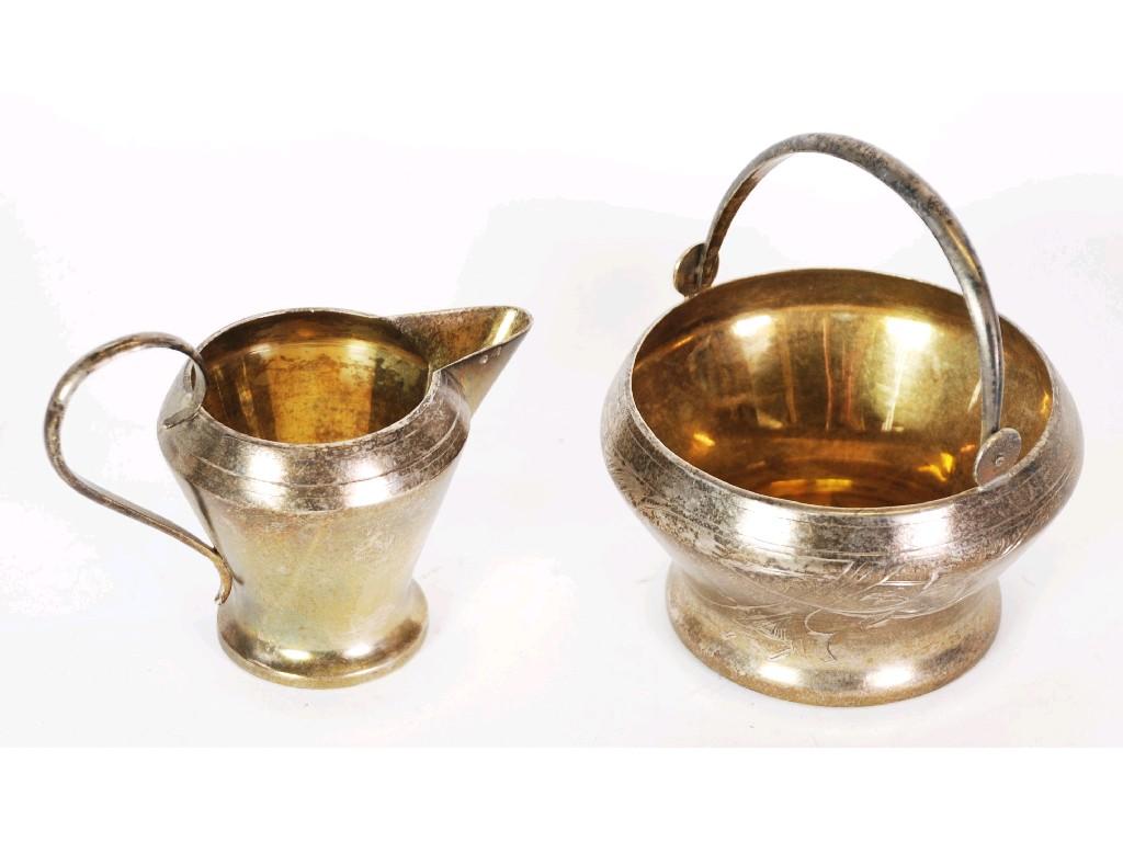 Appraisal: RUSSIAN SILVER COLOURED METAL Standard SWING HANDLED SUGAR BASIN AND