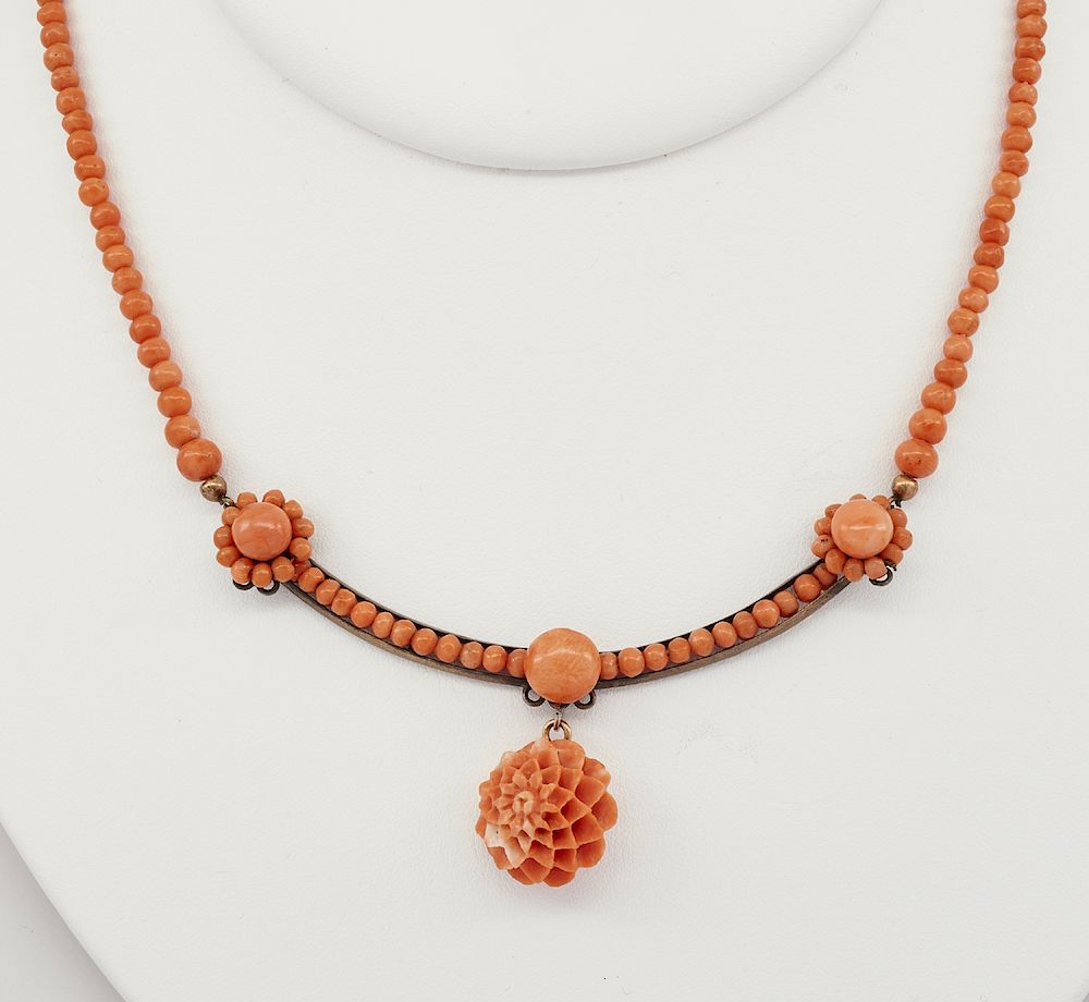 Appraisal: Victorian carved coral necklace with flower Victorian carved coral necklace