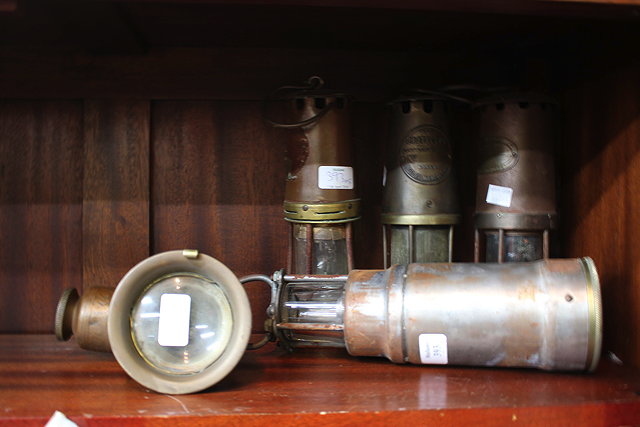 Appraisal: A GROUP OF FOUR VARIOUS OLD MINERS LAMPS together with