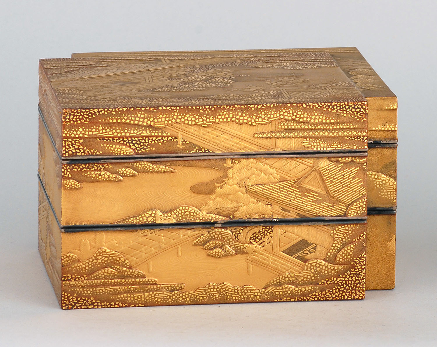 Appraisal: TWO-PART GOLD LACQUER COVERED BOX Mid- th CenturyIn double rectangle