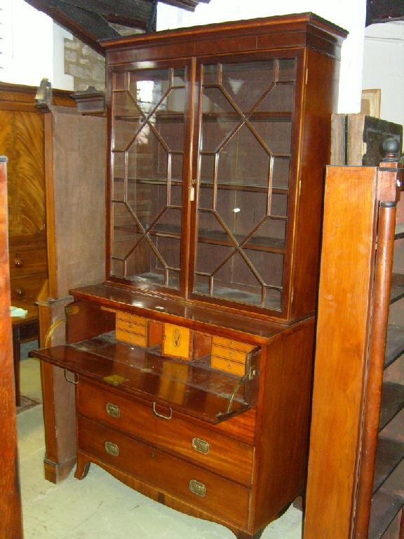 Appraisal: A Regency mahogany secretaire bookcase the lower section fitted with