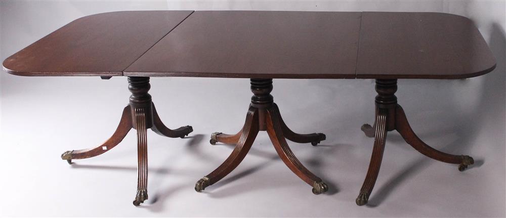 Appraisal: GEORGE III-STYLE MAHOGANY TRIPLE-PEDESTAL DINING TABLE having a rectangular top