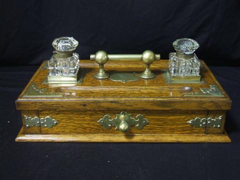 Appraisal: VICTORIAN METAL-MOUNTED OAK INKSTAND th century with rectangular brass mounted