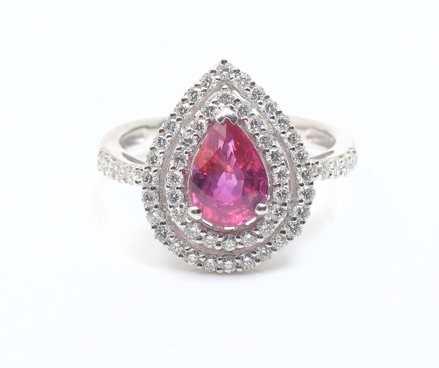 Appraisal: PLATINUM UNHEATED RUBY DIAMOND RING CT pear shaped purplish-pink ruby