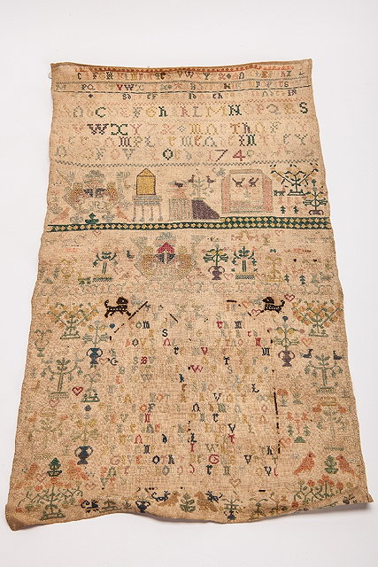 Appraisal: AN TH CENTURY ENGLISH CHILD'S NEEDLEWORK UNFINISHED SAMPLER with partially