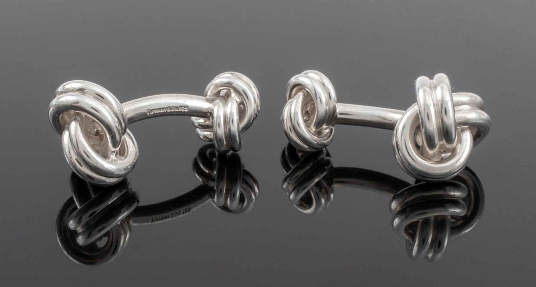 Appraisal: TIFFANY CO SILVER KNOT CUFFLINKS Pair of Tiffany Co cufflinks