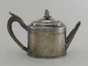 Appraisal: A George III silver oval drum teapot with bright cut