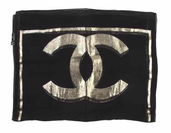 Appraisal: A Chanel Silk Scarf in a metallic gold logo motif