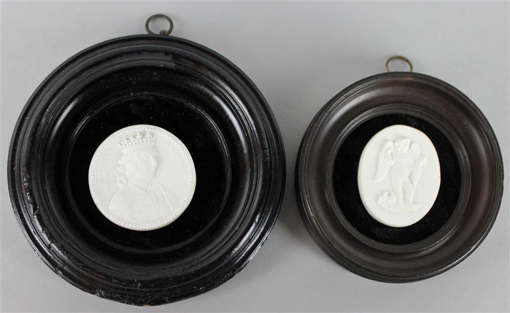 Appraisal: TWO GLASS PASTE MEDALLIONS IN THE MANNER OF JAMES TASSIE