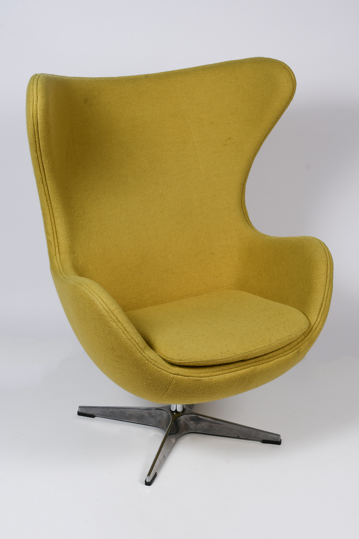 Appraisal: SWIVEL EGG CHAIR IN THE STYLE OF ''ARNE JACOBSEN'' Egg