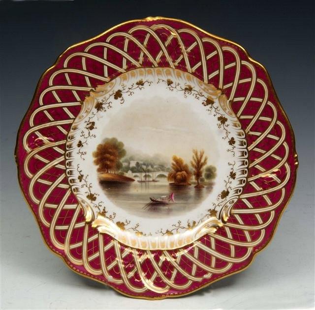 Appraisal: A PORCELAIN PROBABLY ROCKINGHAM CABINET PLATE painted with Richmond Bridge