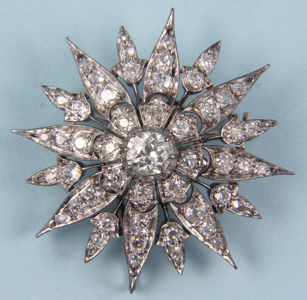 Appraisal: Late th-early th Century diamond and k gold starburst brooch