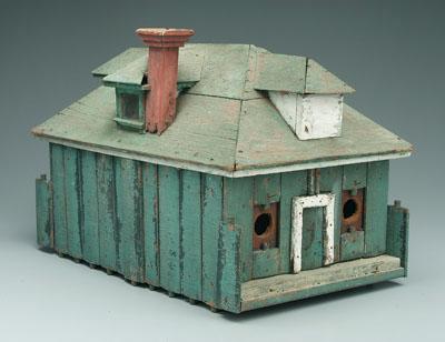 Appraisal: Painted wooden birdhouse nailed elements with four entry holes three