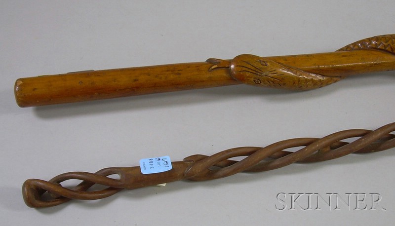 Appraisal: Two Folk Carved Wooden Walking Sticks one with open spiral