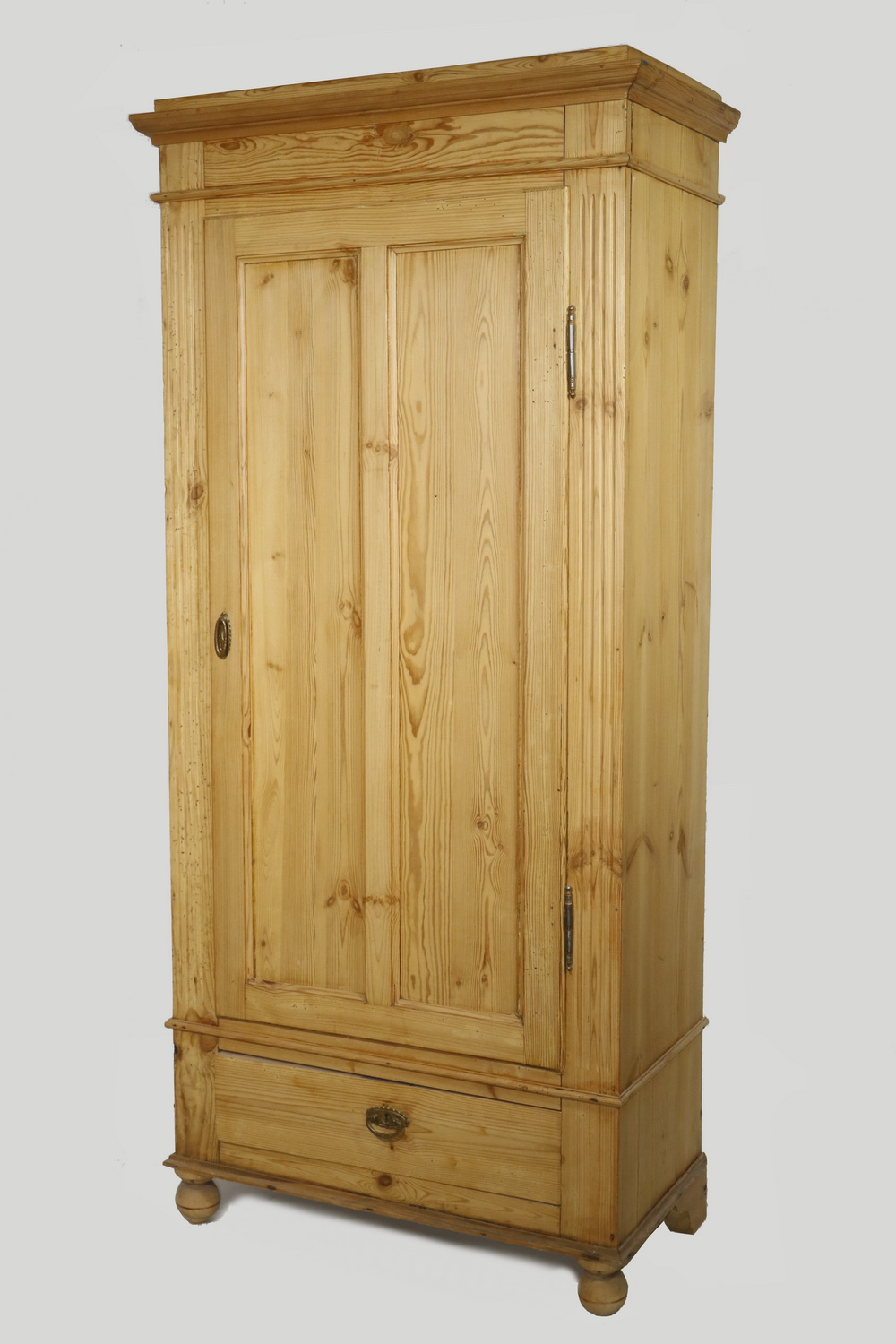 Appraisal: SCRUBBED PINE WARDROBE Small scrubbed pine wardrobe with single two