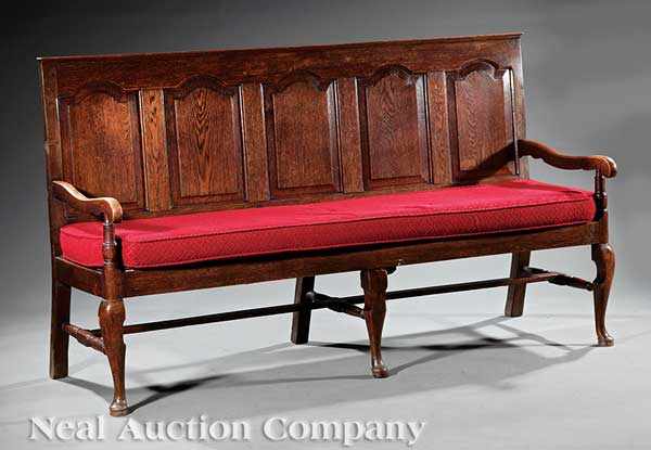 Appraisal: A Queen Anne Carved Oak Settle late th c raised