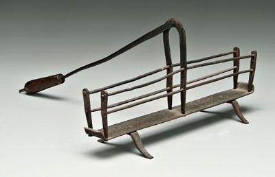 Appraisal: Wrought iron toaster rods through pierced uprights shaped and riveted