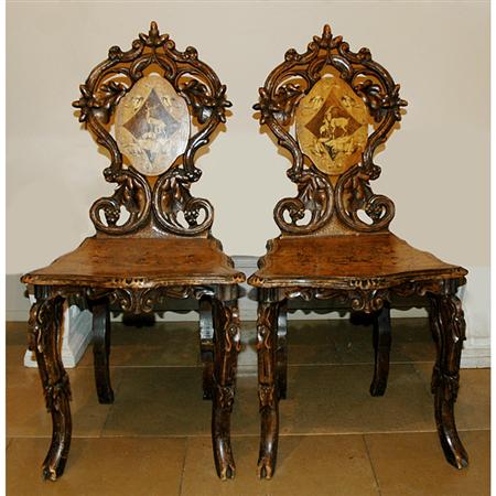 Appraisal: Pair of Swiss Carved Walnut Side Chairs Estimate -