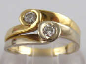 Appraisal: A yellow metal tests carat gold two stone diamond ring