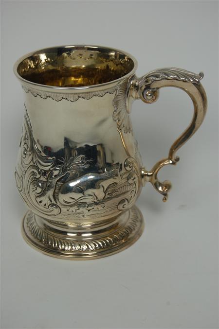 Appraisal: A George III baluster mug by William Grundy London the