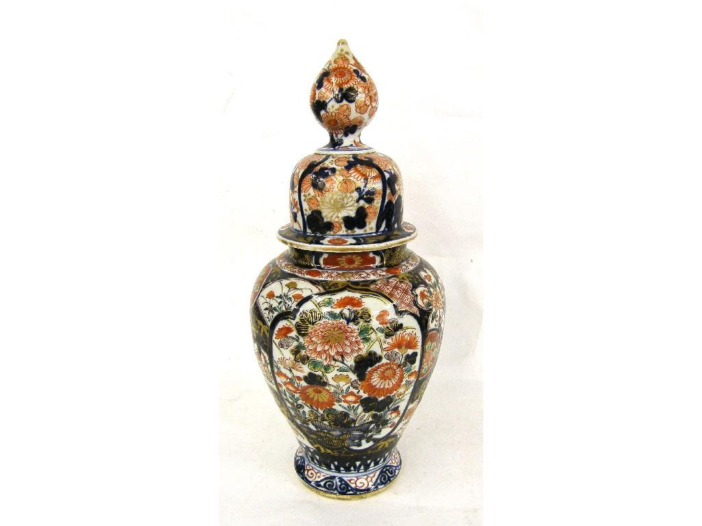 Appraisal: Japanese Imari baluster vase and cover decorated in typical palette