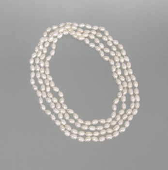 Appraisal: A Strand of Oval Freshwater Pearls A hand-knotted strand of