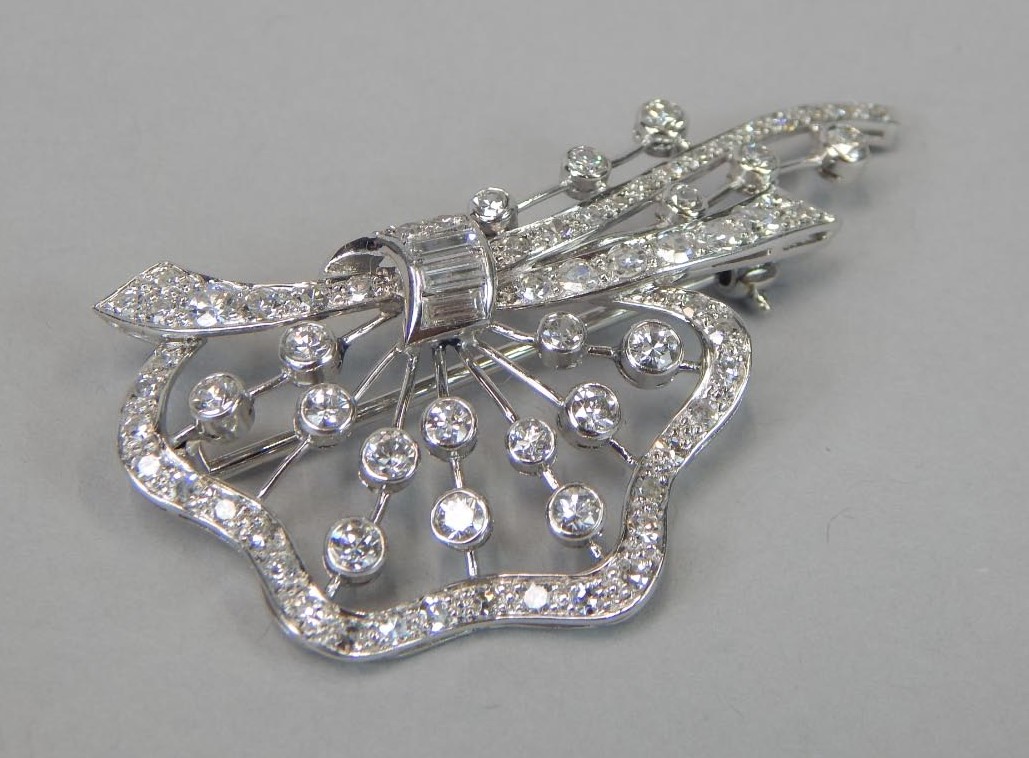 Appraisal: An Art Deco style diamond set brooch stylised floral and