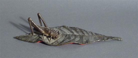 Appraisal: Japanese bronze grasshopper on leaf Late th early th century