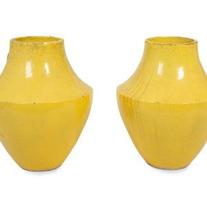 Appraisal: A Pair of Large Yellow-Glazed Pottery Jars Each x inches