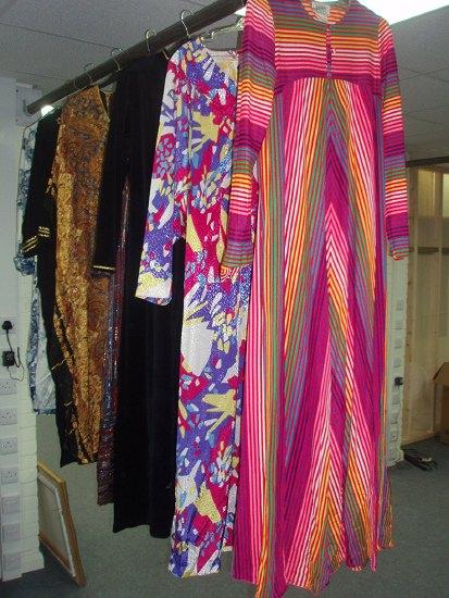 Appraisal: A quantity of kaftans and dresses including examples by David