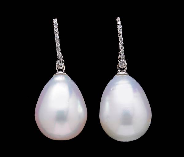 Appraisal: A pair South Sea cultured pearl earrings pearls measuring approximately