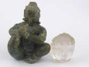 Appraisal: A carved rock crystal head approx cm and a green