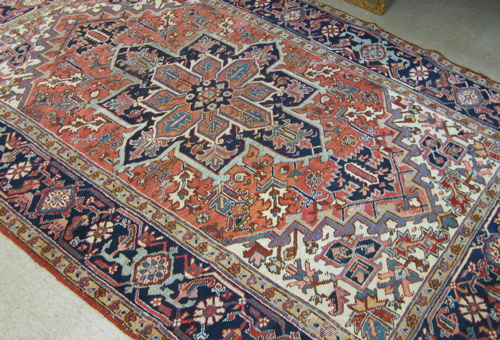 Appraisal: SEMI-ANTIQUE PERSIAN HERIZ CARPET Azarbaijan province eastern Iran centering a