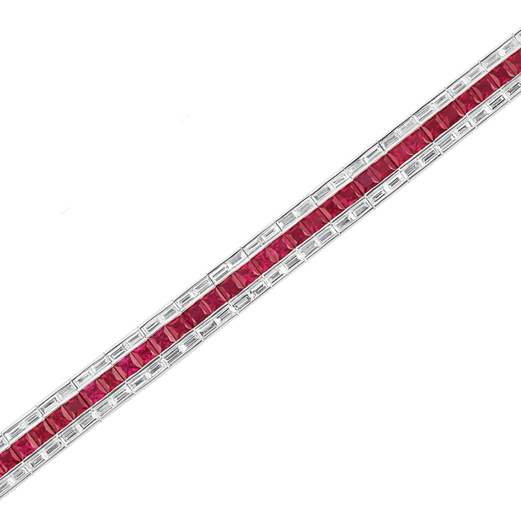 Appraisal: White Gold Ruby and Diamond Straightline Bracelet kt centering a