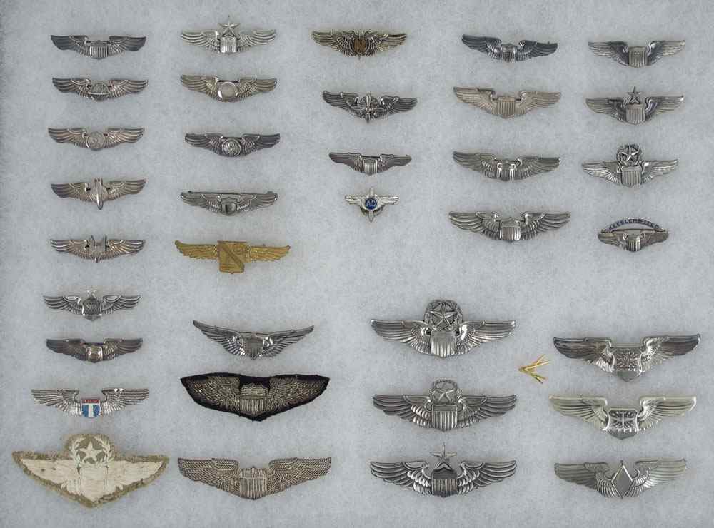 Appraisal: COLLECTION OF STERLING OTHER AVIATOR WINGS To include Approx ''