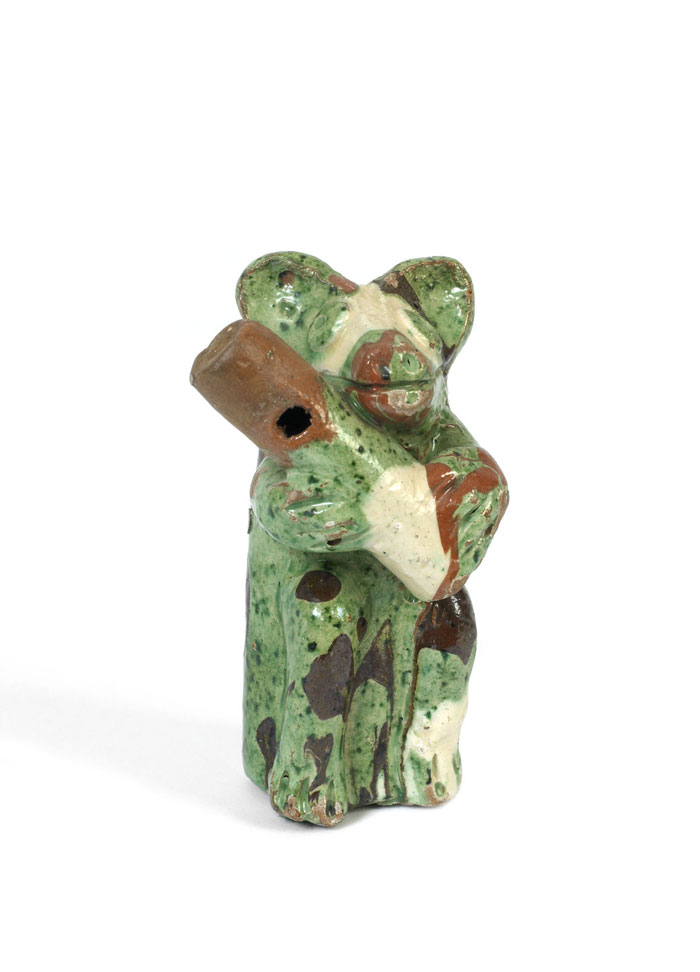 Appraisal: BEAR-FORM GREEN GLAZED CERAMIC WHISTLE Height inches