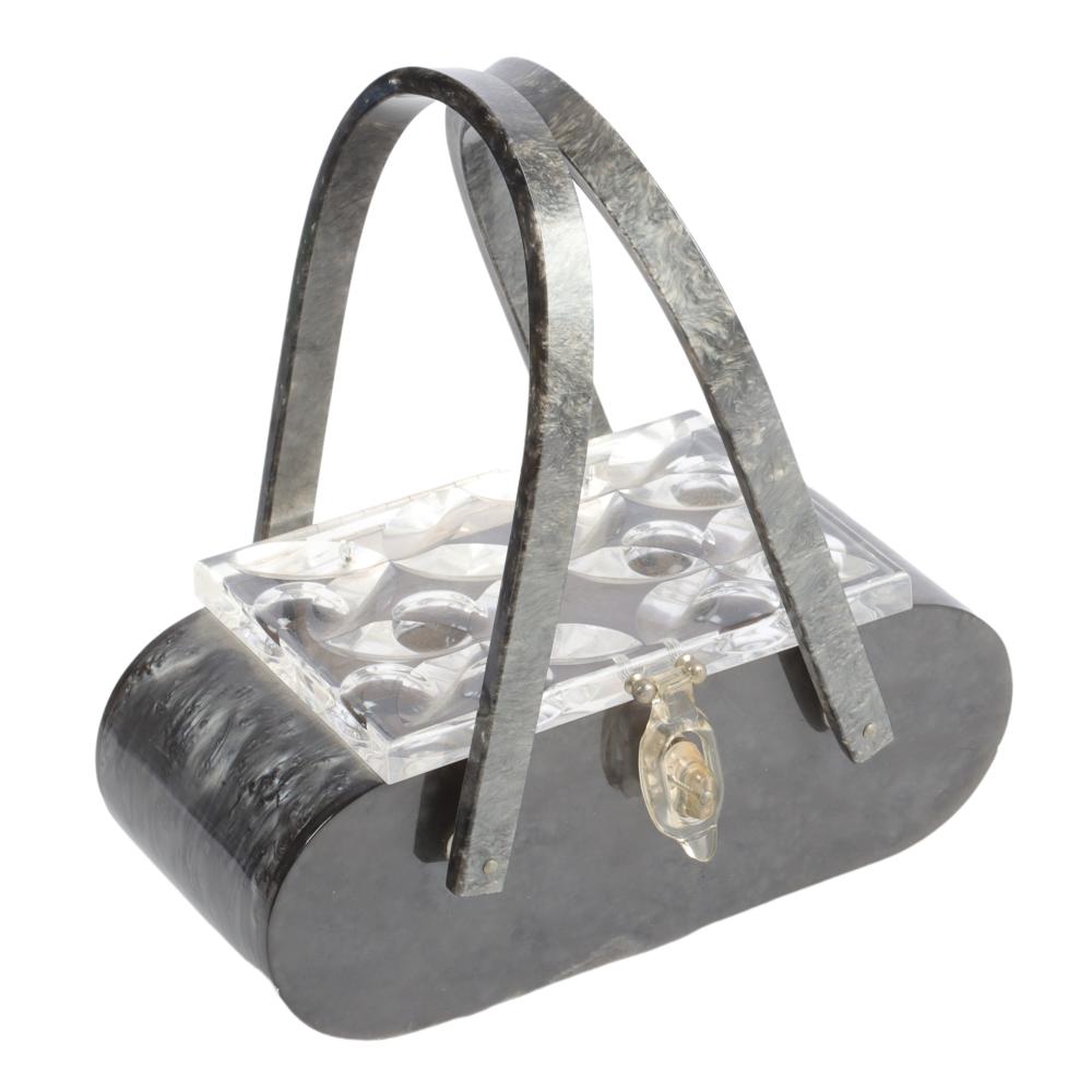 Appraisal: GRAY ACETATE LONG FLAT OVAL BAG WITH CLEAR CARVED LUCITE