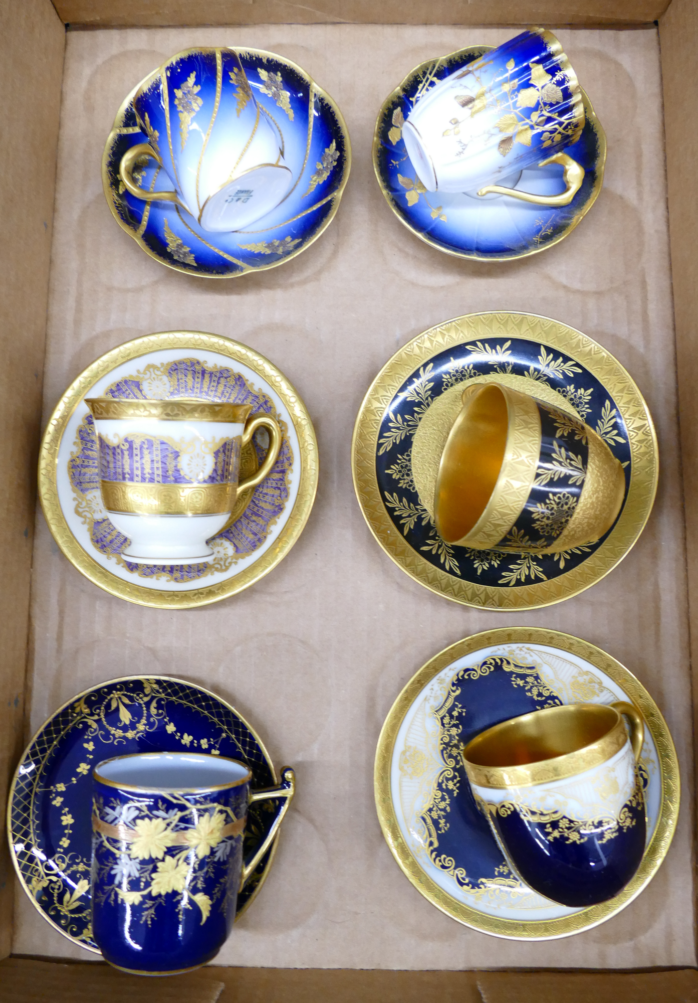 Appraisal: Box pc Gilt Cobalt Cup Saucers