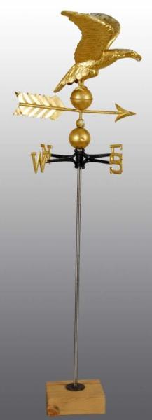 Appraisal: Eagle Weather Vane w Base Description Gold gilt Directional letters