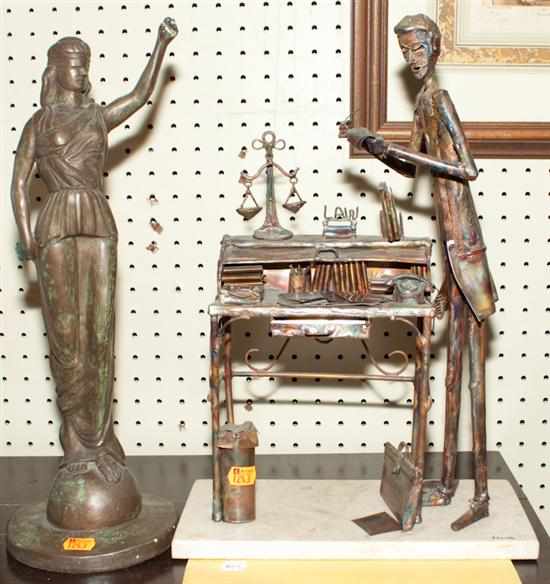 Appraisal: Contemporary metal sculpture of a teacher at his desk mounted