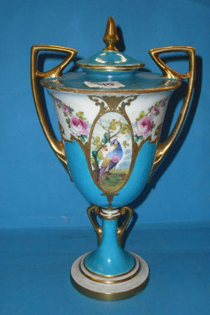 Appraisal: Minton two handled vase cover handpainted with panels of peacocks