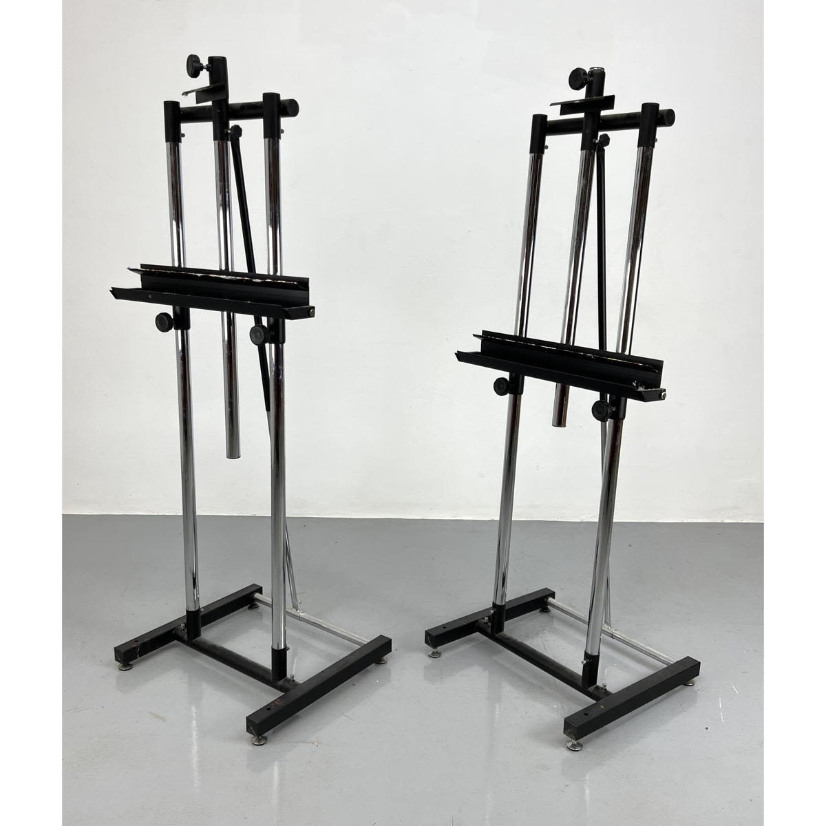 Appraisal: Pair Italian Chrome and steel artist Easels Dimensions H inches