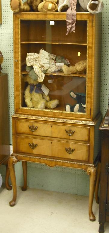 Appraisal: Waring Gillow Georgian style walnut display cabinet on stand wide