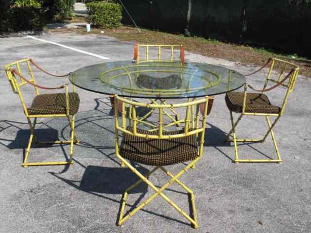 Appraisal: Dining set comprised of a '' round glass table top