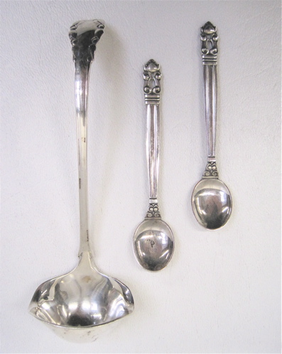 Appraisal: THREE PIECES GEORG JENSEN STERLING SILVER sauce ladle in the