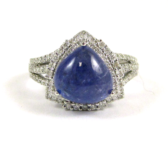 Appraisal: TANZANITE DIAMOND AND FOURTEEN KARAT GOLD RING The white gold