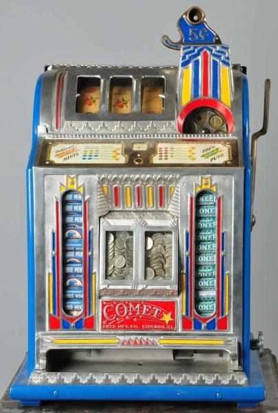 Appraisal: Fancy Front Pay Slot Machine Description With twin jackpots and