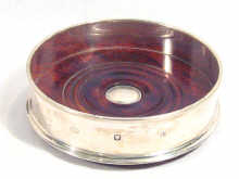 Appraisal: A hallmarked English silver wine coaster cm diameter