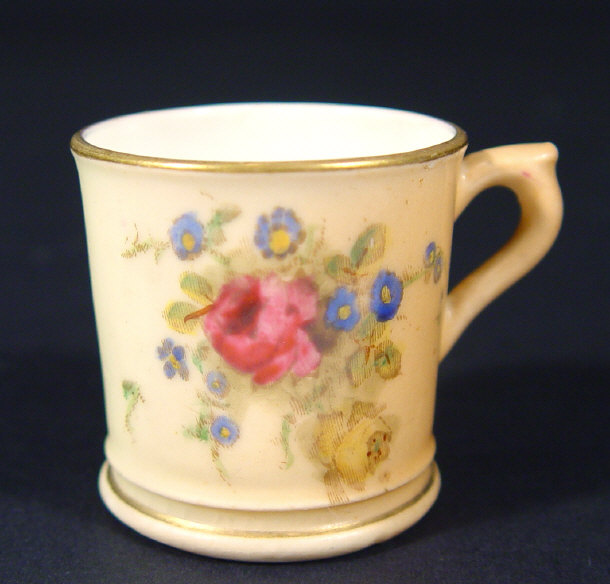 Appraisal: Miniature Royal Worcester blush ivory ground tankard hand coloured and